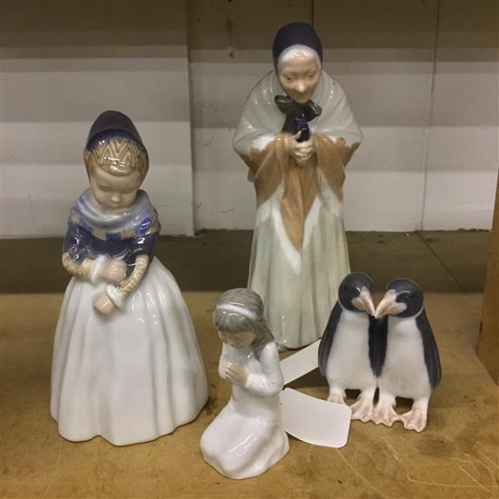 4 Royal Copenhagen figures, inc Churchgoer (892), Amager Girl (1251), Girl Praying (5654) & Penguins (1190)